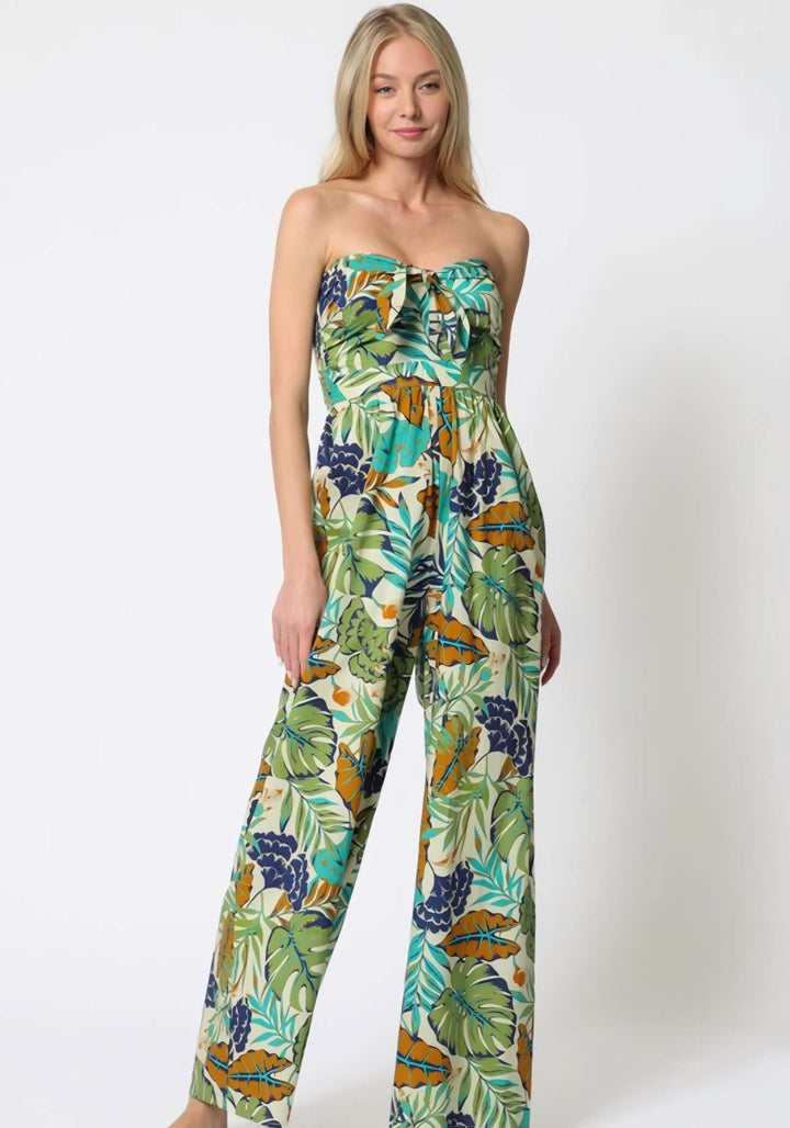 Women’s green strapless jumpsuit with palm leaf print – perfect vacation style