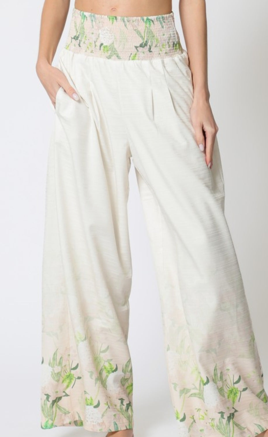 Floral-patterned pants on a white background