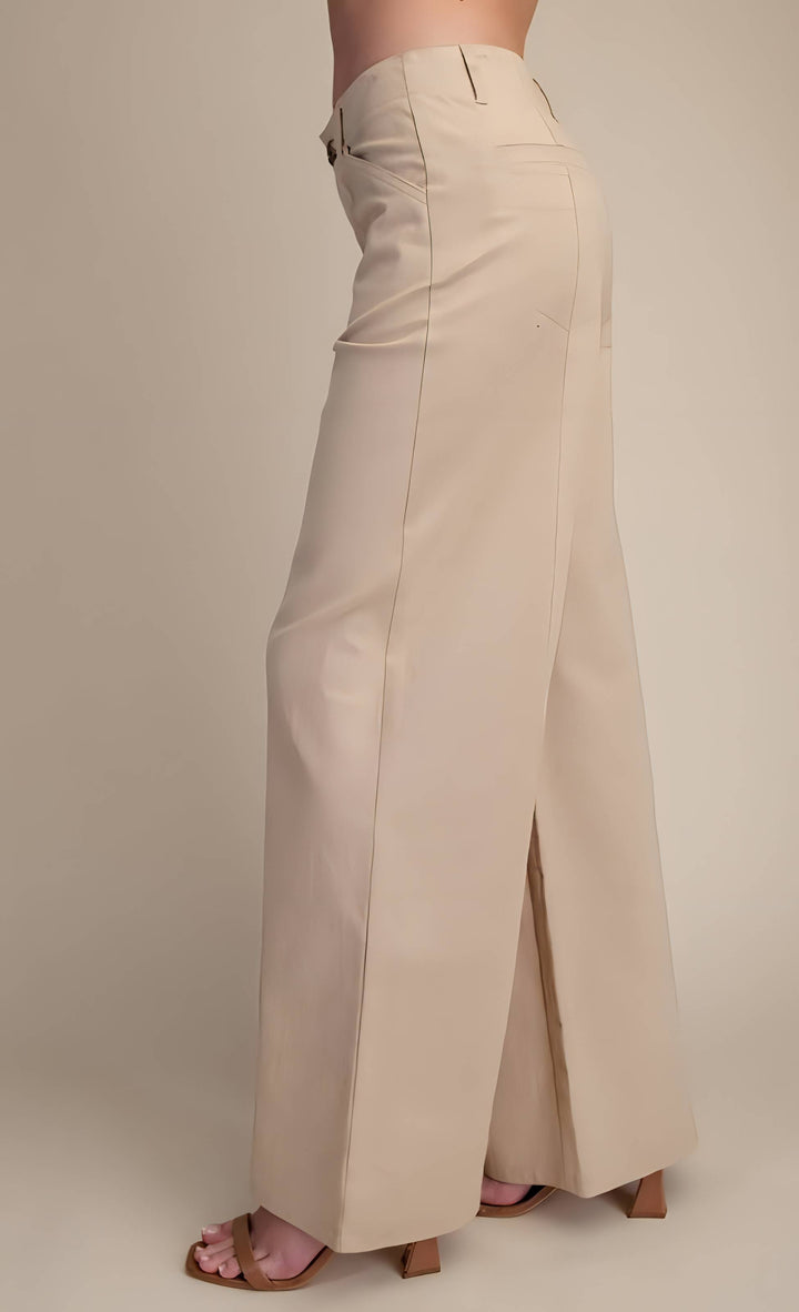 Beige wide-leg pants on a neutral background