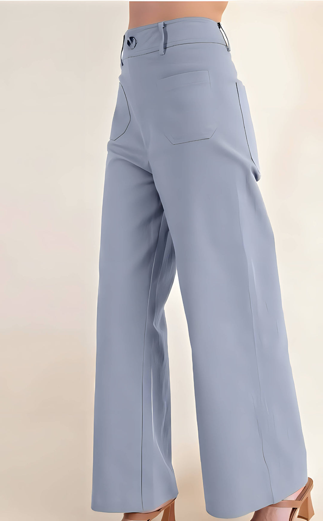 Light blue pants on a beige background