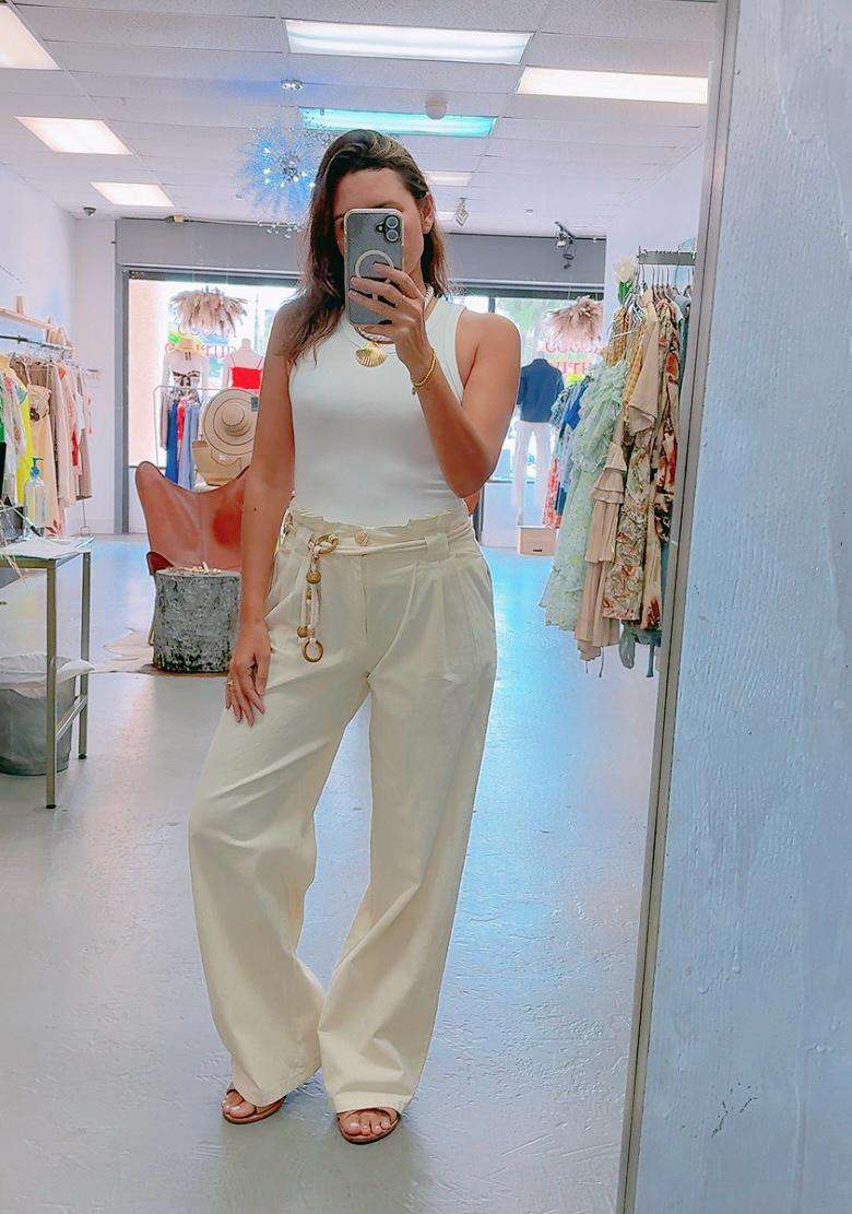 Women's beige pleated belted pants – high-waisted, tailored trousers for workwear or casual chic style