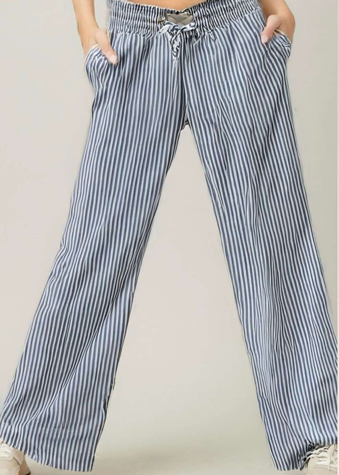 Make a statement in our blue striped wide leg pants. Lightweight, breathable, and ultra-flattering—perfect for work or weekend wear.