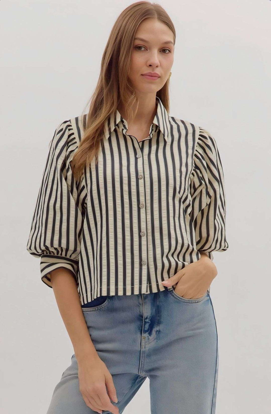 Black and white vertical stripe blouse with button front and 3/4 length sleeves