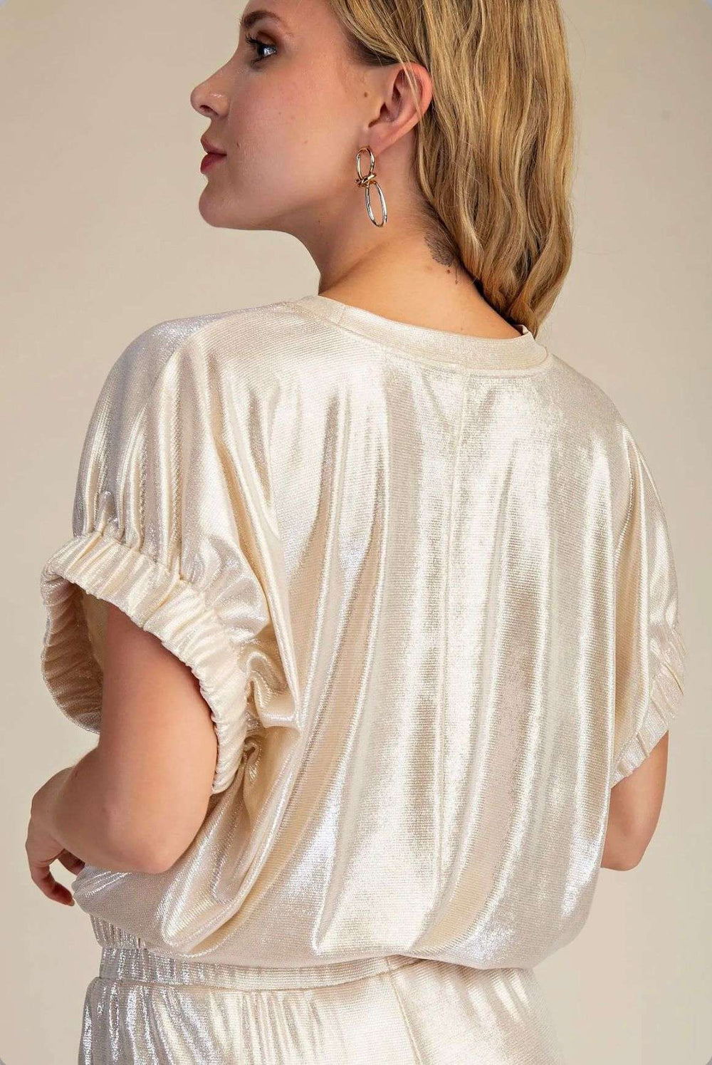 Women's champagne top with defined waistband – elegant and flattering blouse for formal or casual wear