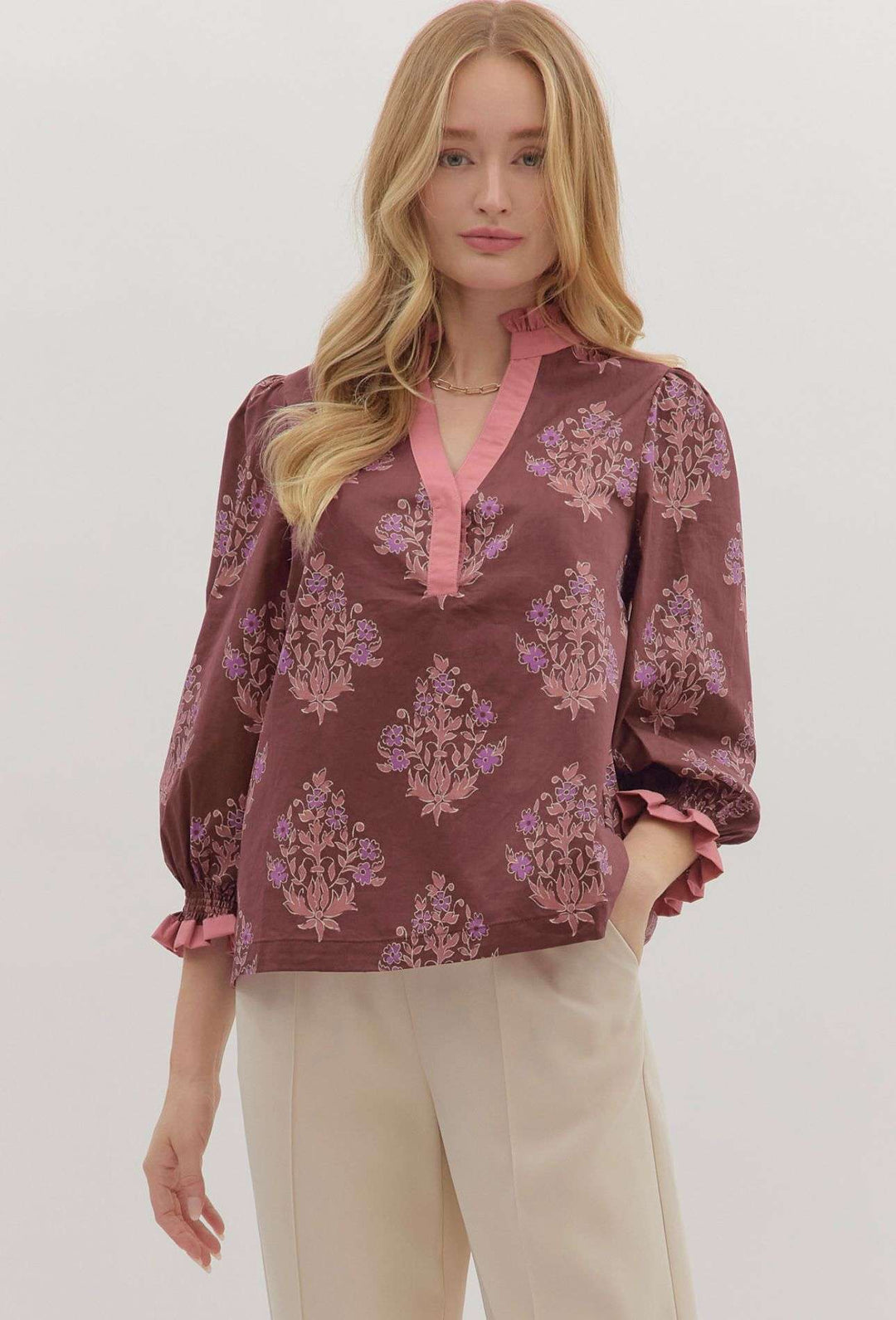 Women’s lavender floral blouse styled for fall with soft floral pattern and relaxed fit