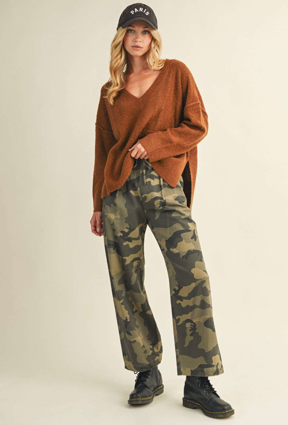 Women’s camo front tie pants with adjustable waist and relaxed fit.