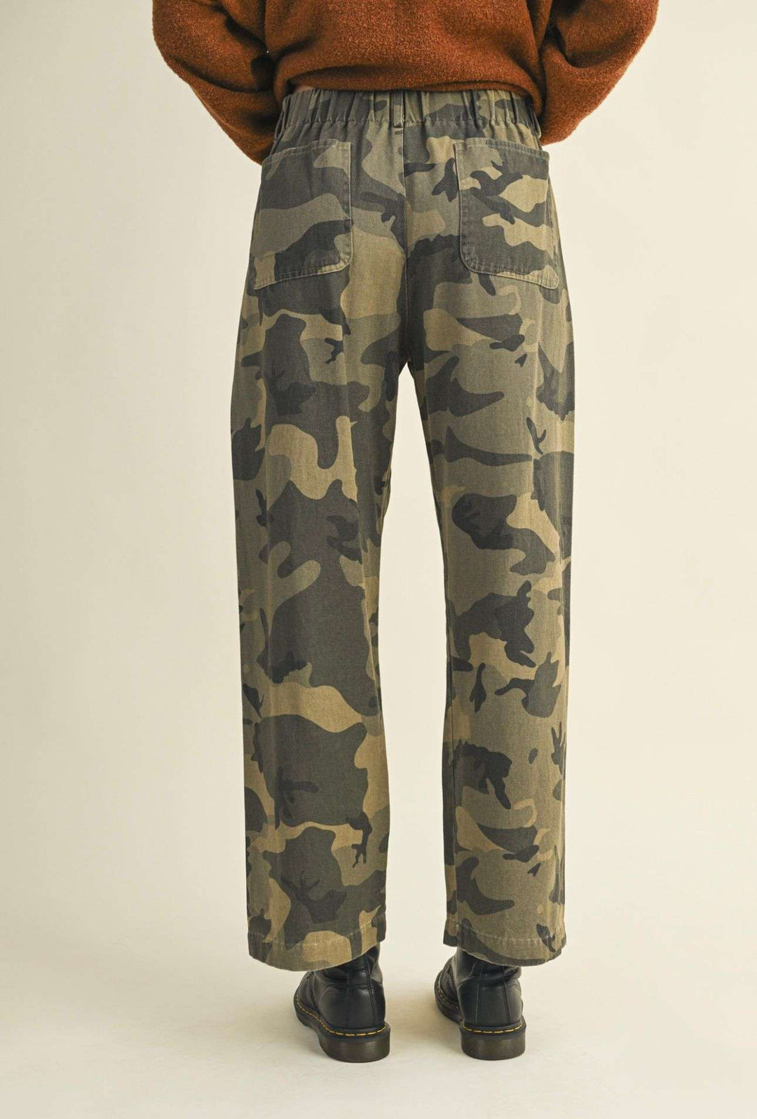 Women’s camo front tie pants with adjustable waist and relaxed fit.