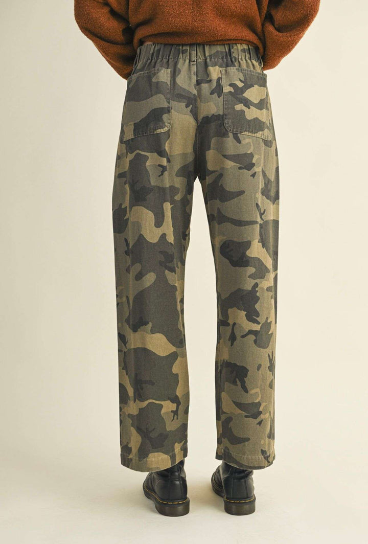 Women’s camo front tie pants with adjustable waist and relaxed fit.