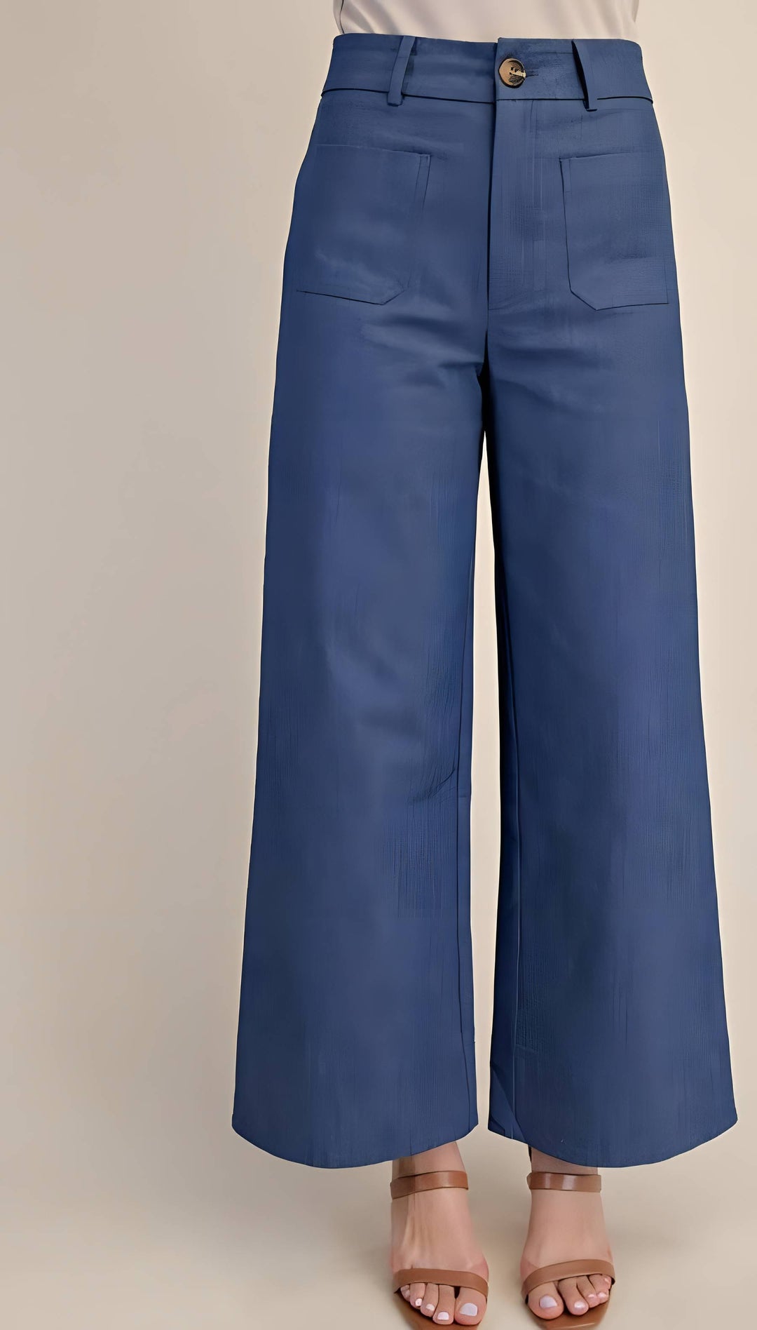 Blue wide-leg pants on a beige background