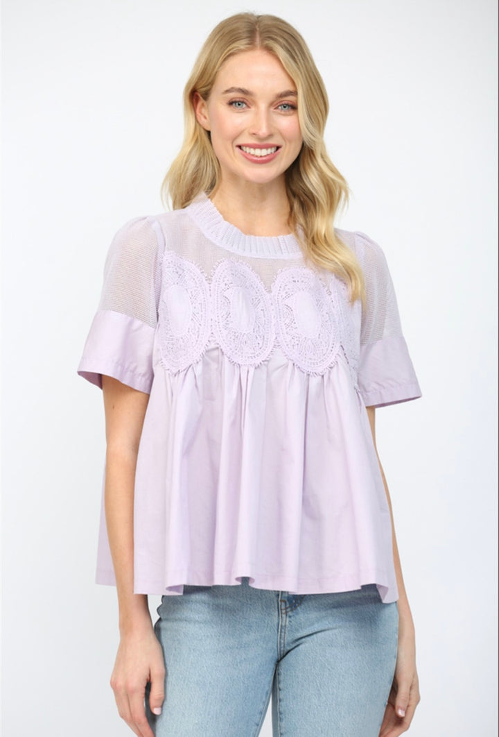 Lavender mesh top with sheer fabric and lightweight breathable design