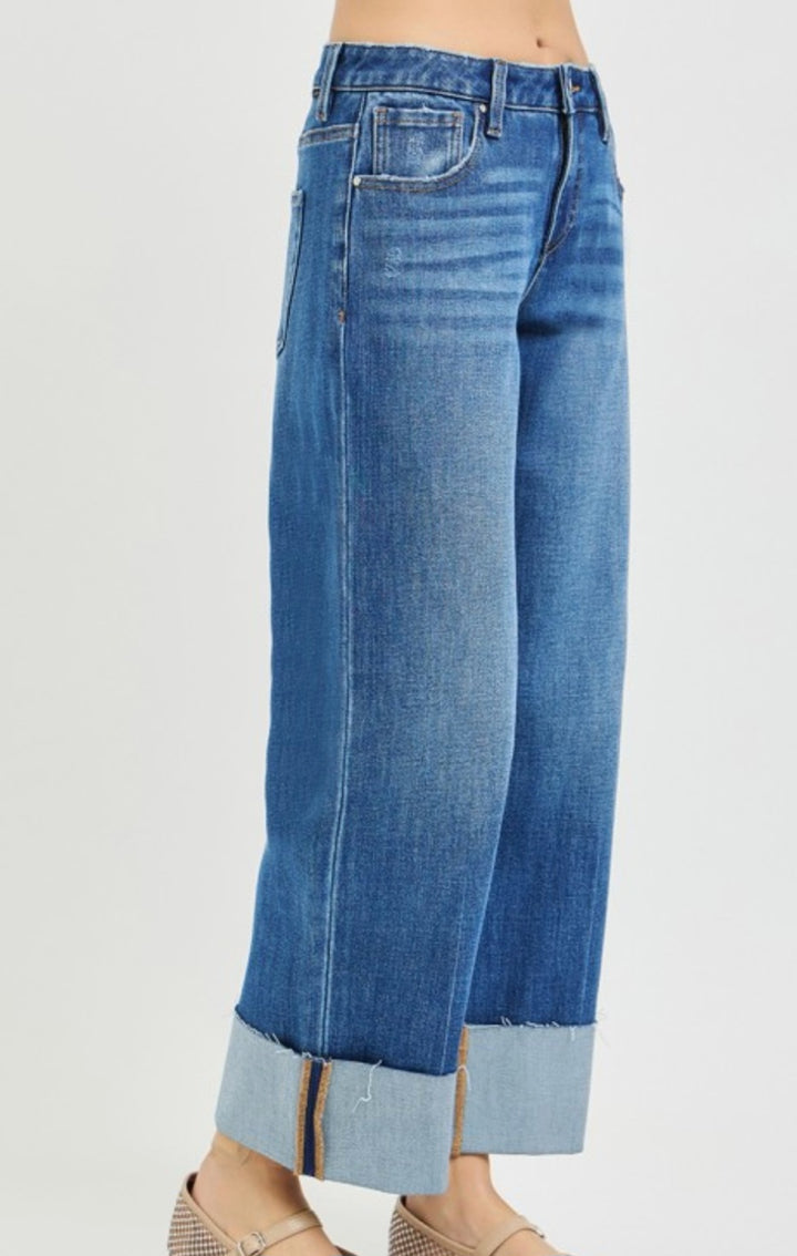 Blue jeans with a white background