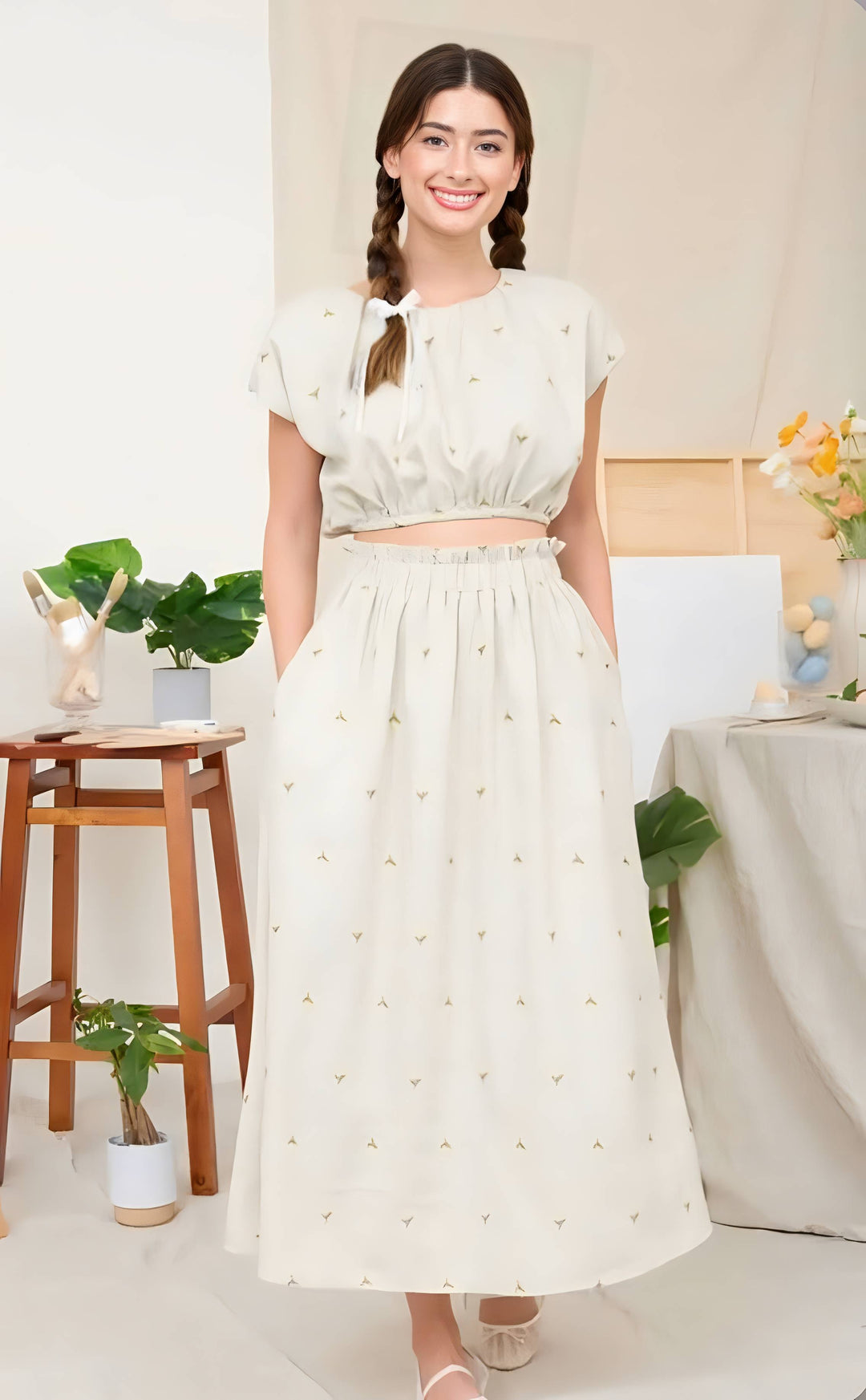 Woman wearing green floral skirt set in livingroom
