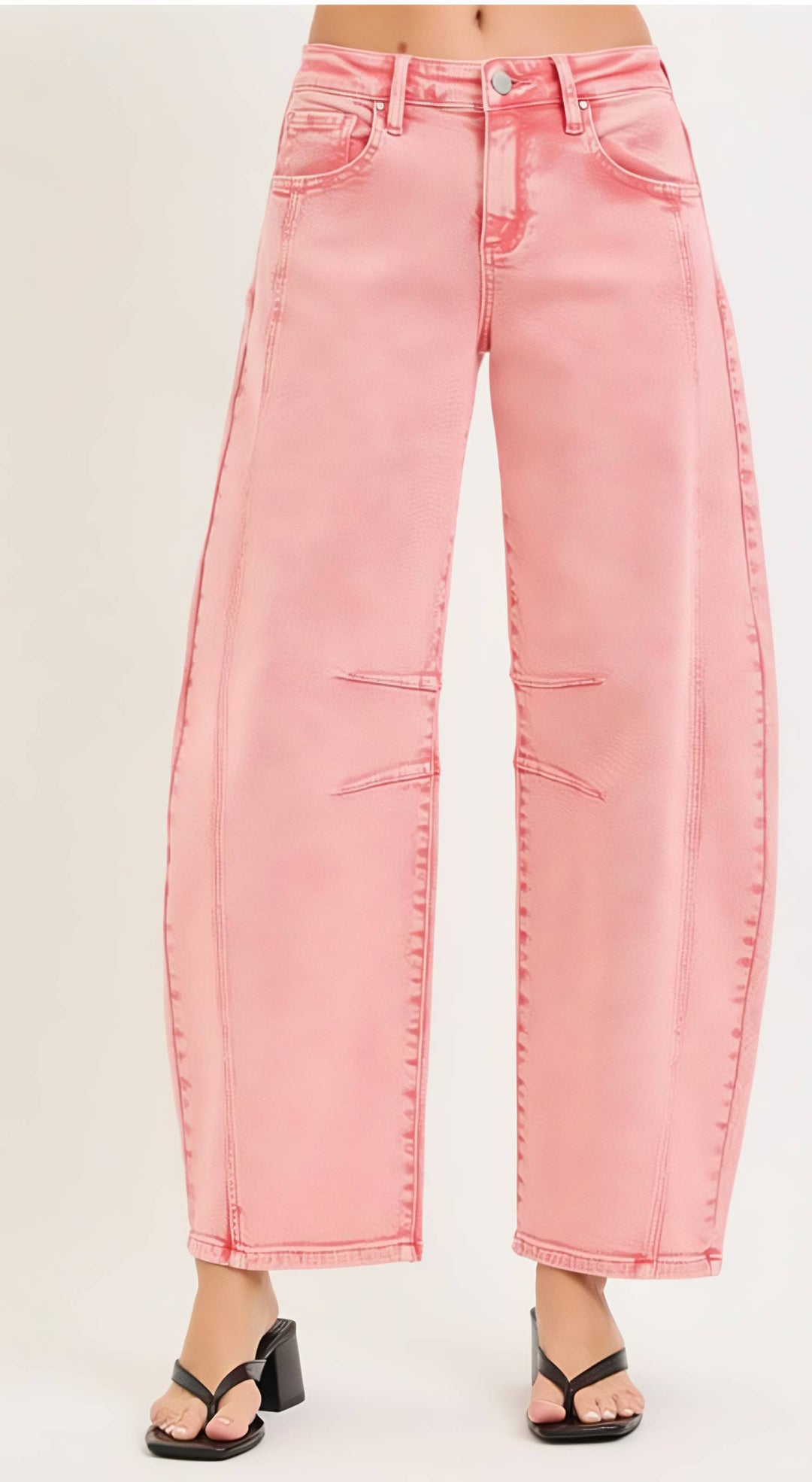 Pink jeans on a white background