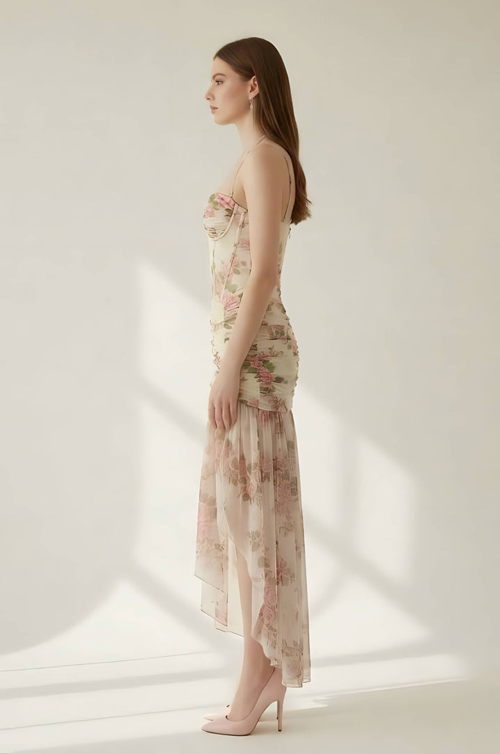 Woman wearing a floral dress against a white background