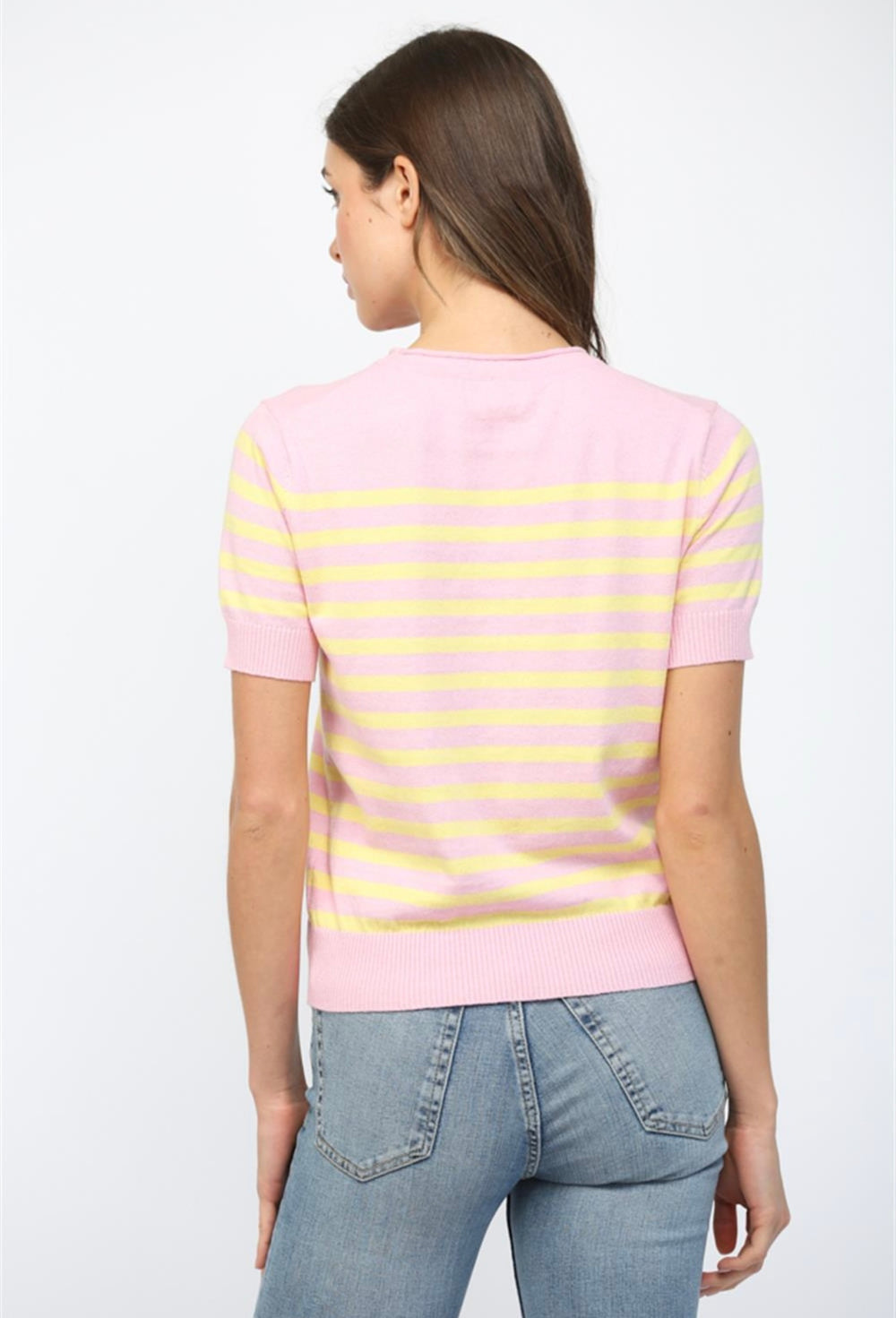 Women’s pink and yellow striped knit top made from soft stretch fabric
