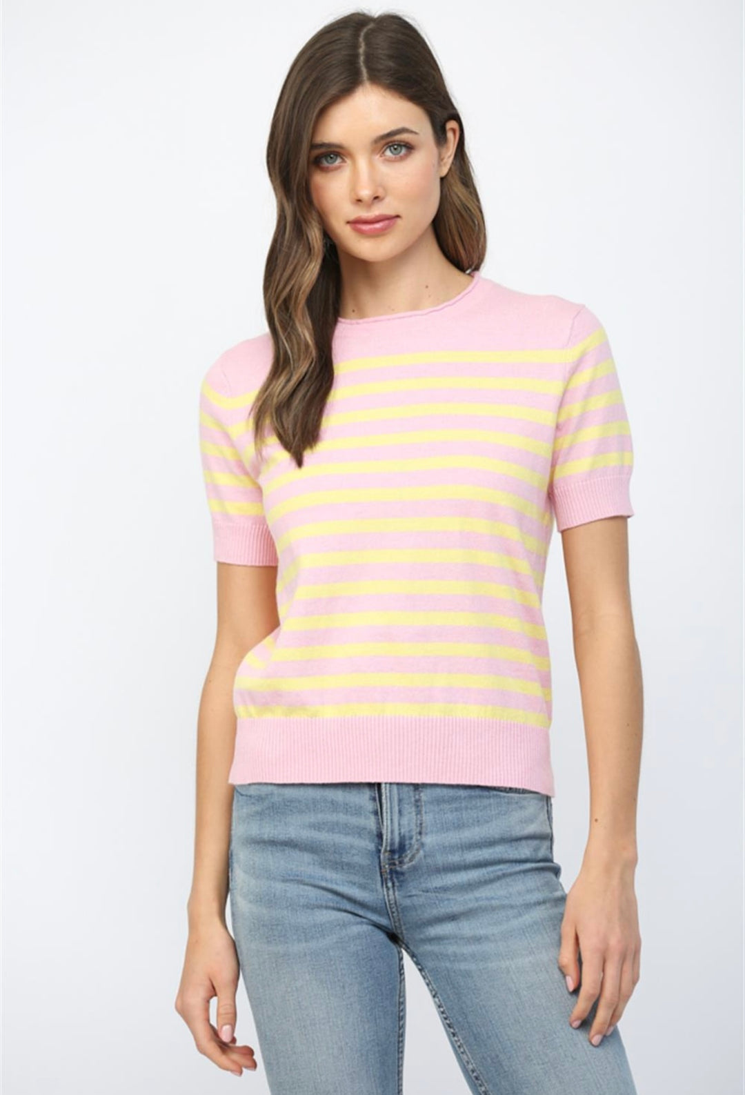 Women’s pink and yellow striped knit top made from soft stretch fabric

