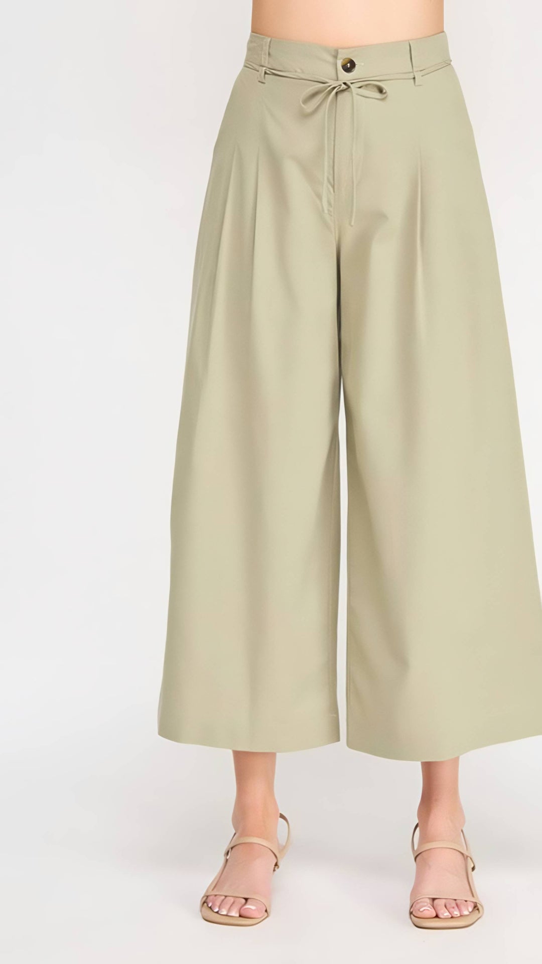 Light green wide-leg pants on a white background