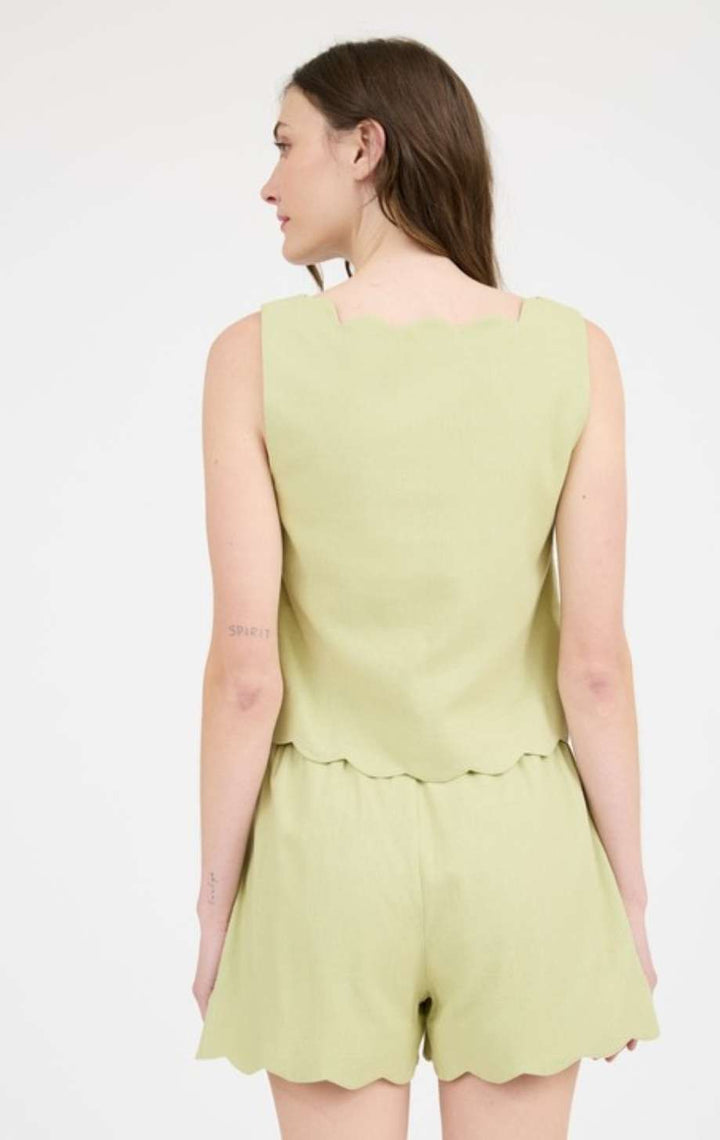 Model wearing kiwi short set for summer