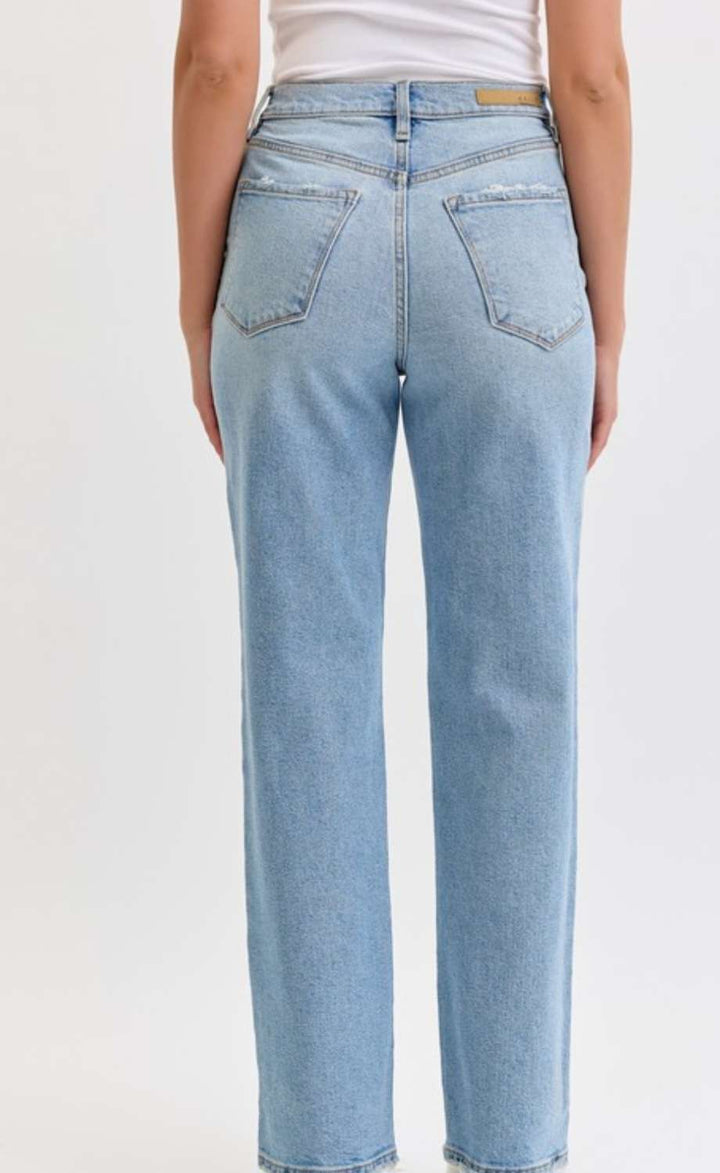 Women's light denim high rise jeans with a slim fit and classic five-pocket design, perfect for casual everyday wear.