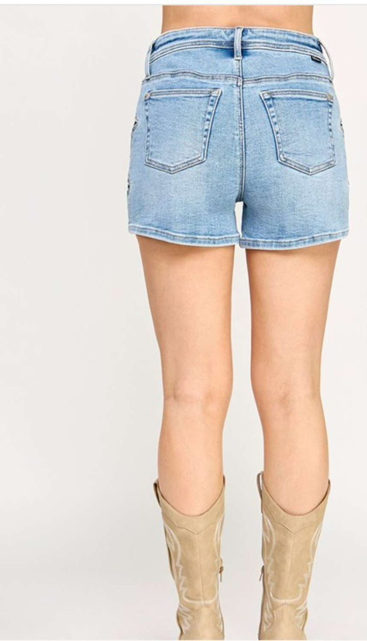 Trendy star denim shorts for summer style.