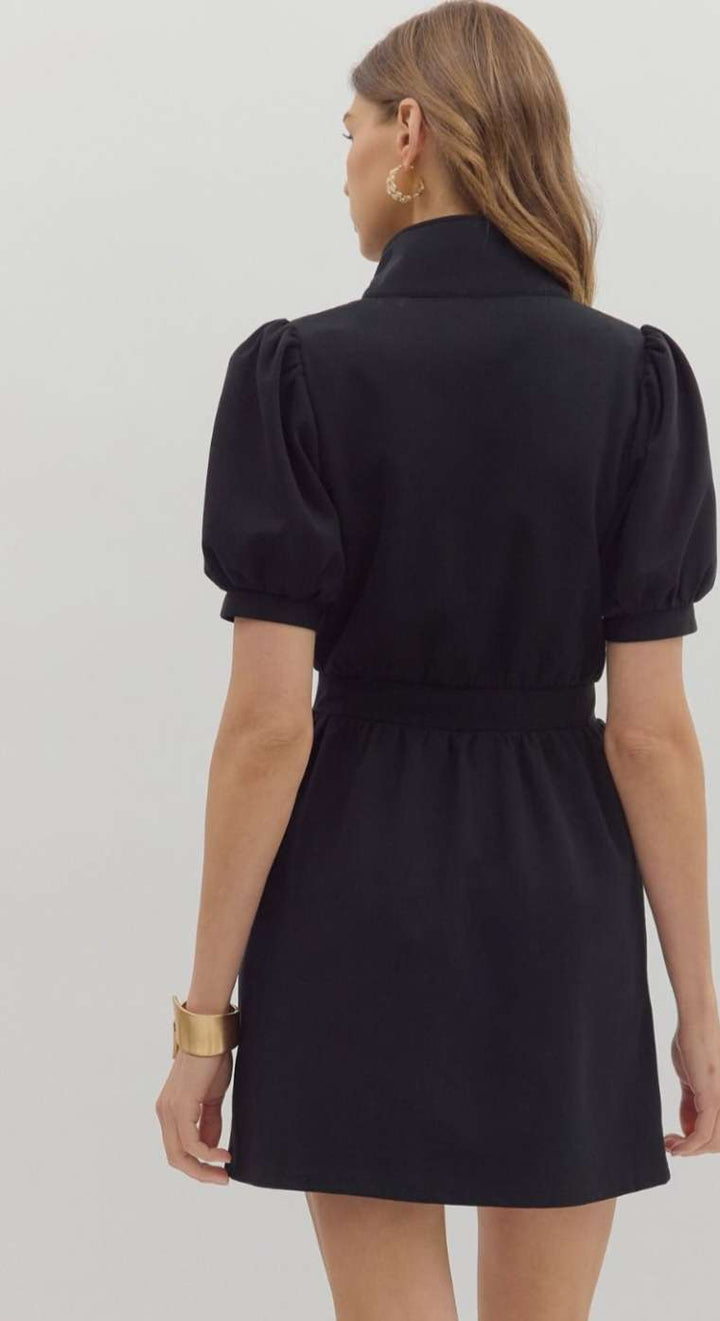 Black zipper dress featuring a sleek silhouette, front zip detail, and flattering fit – perfect for both casual and dressy occasions.