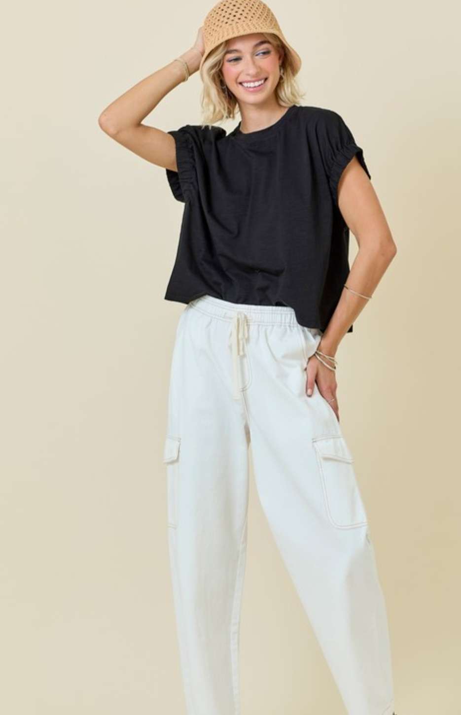 Elevate your everyday look with our Black Elastic Sleeve Tee – a sleek, modern fit with stretchy comfort, perfect for streetwear or casual style.