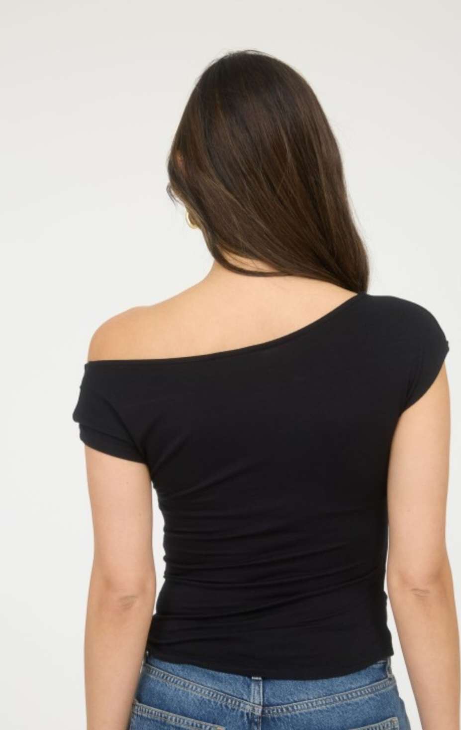 Stylish black off one shoulder top for women – trendy asymmetrical neckline, perfect for evening outings, parties, and chic casual wear.