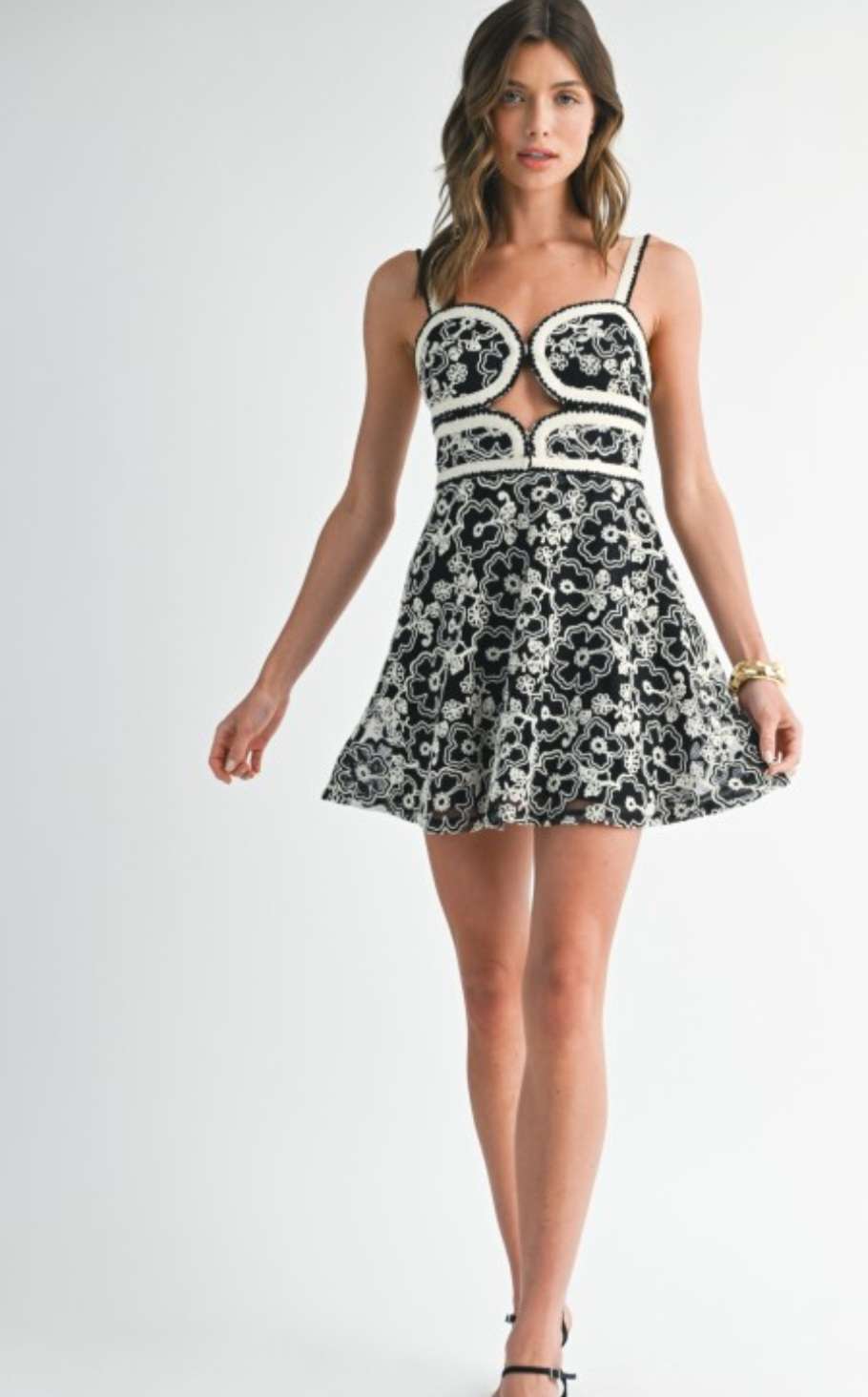 Women's black embroidered mini dress with short sleeves and detailed stitching – elegant boho-inspired short dress for casual or semi-formal occasions