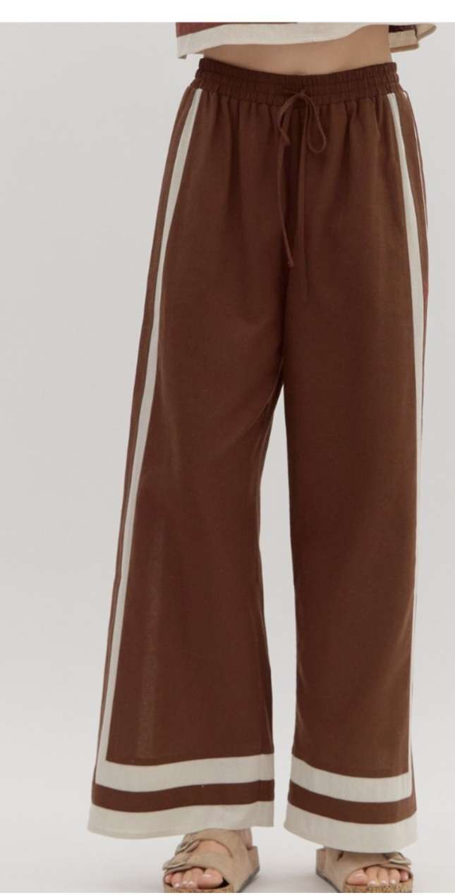 Women's brown trousers featuring beige side stripes for a sporty-chic look