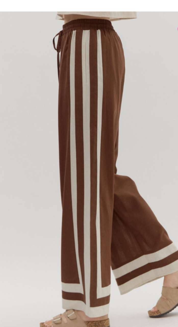 Women's brown trousers featuring beige side stripes for a sporty-chic look