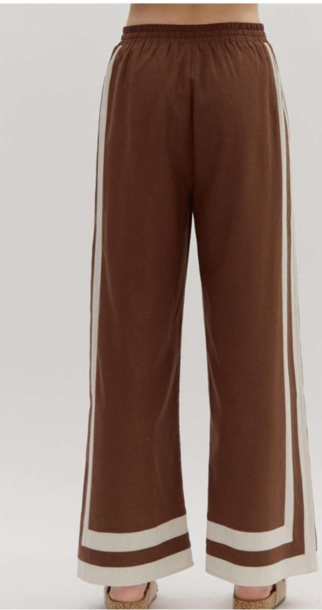 Women's brown trousers featuring beige side stripes for a sporty-chic look