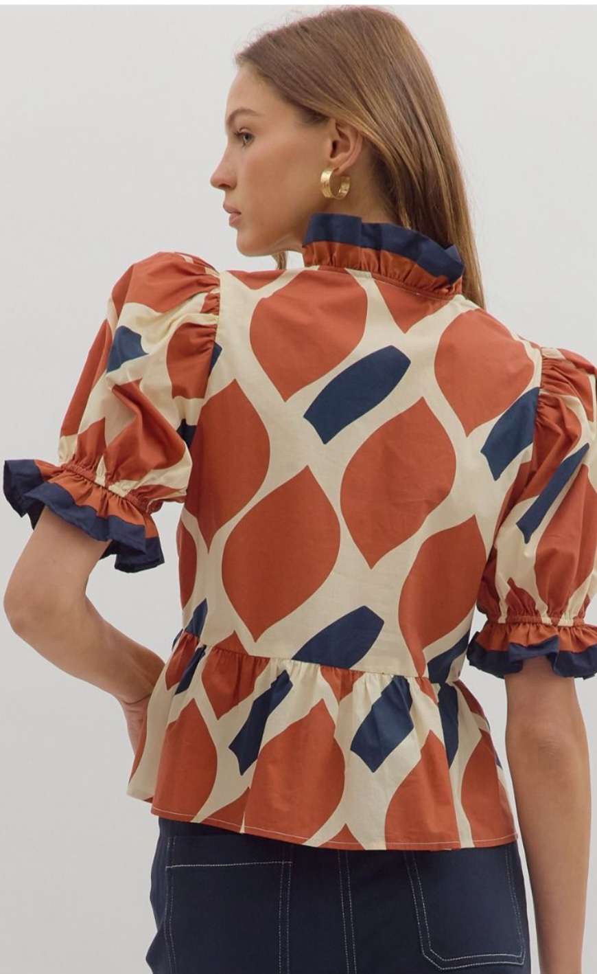 Women's rust abstract print peplum top with sleeveless design and flared waist – stylish casual blouse for fall or summer outfits