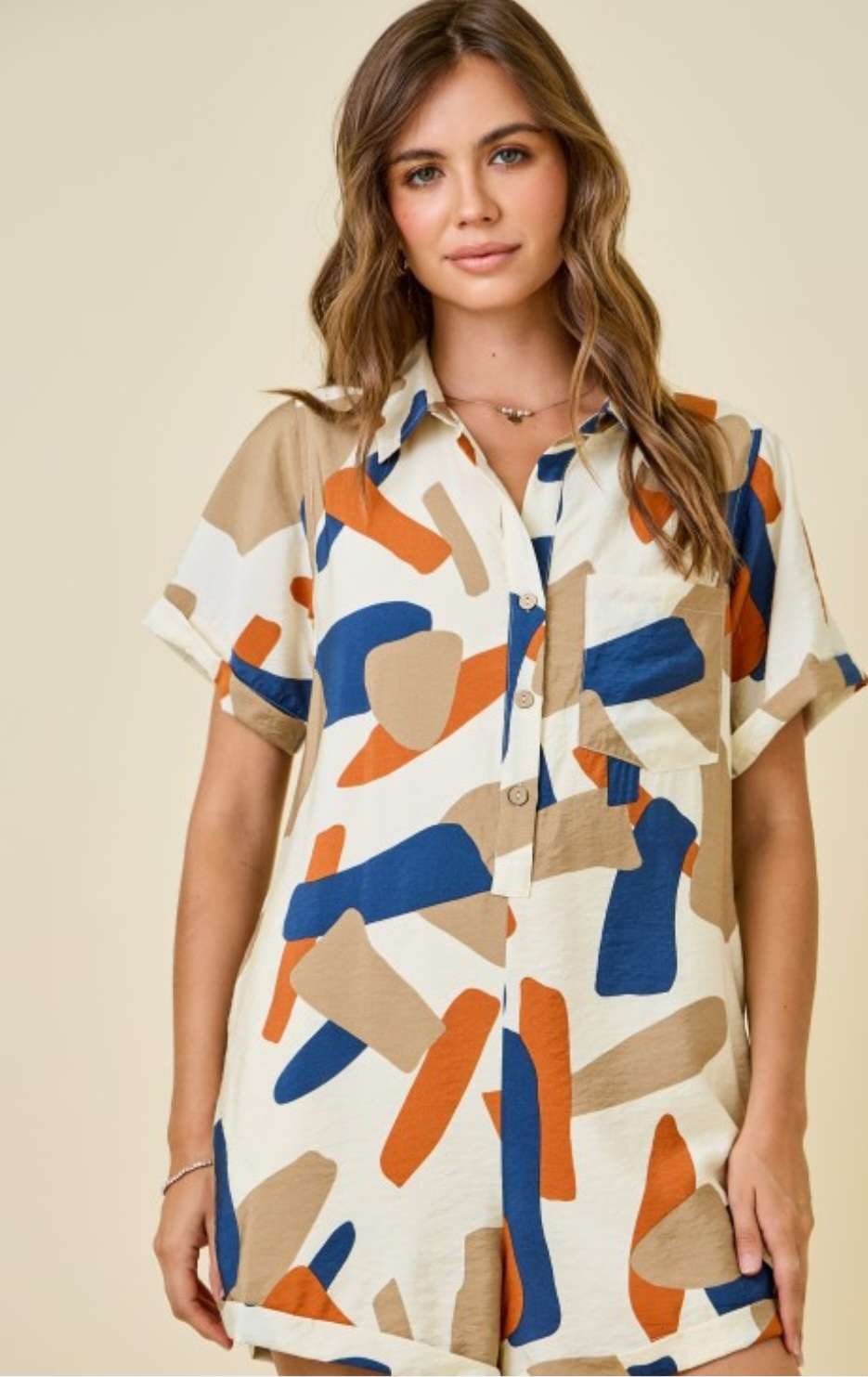 Boho-style rust romper with bold geometric prints – fashion inspiration