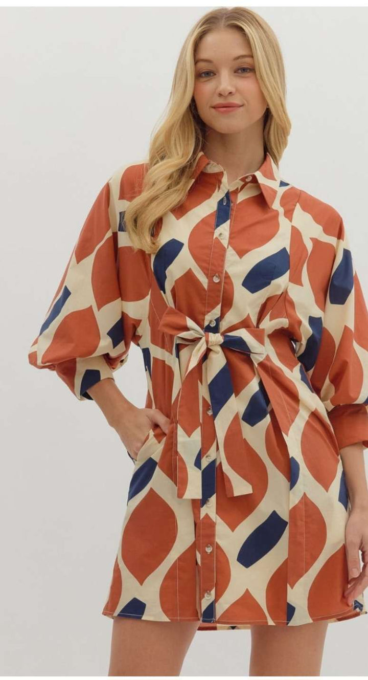 Rust abstract print shirt dress with buttons and casual silhouette