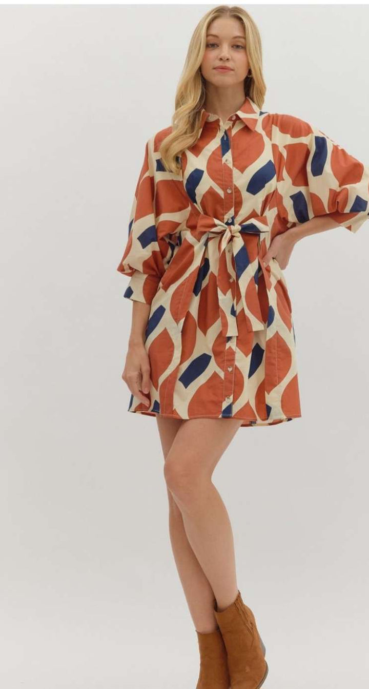 Rust abstract print shirt dress with buttons and casual silhouette