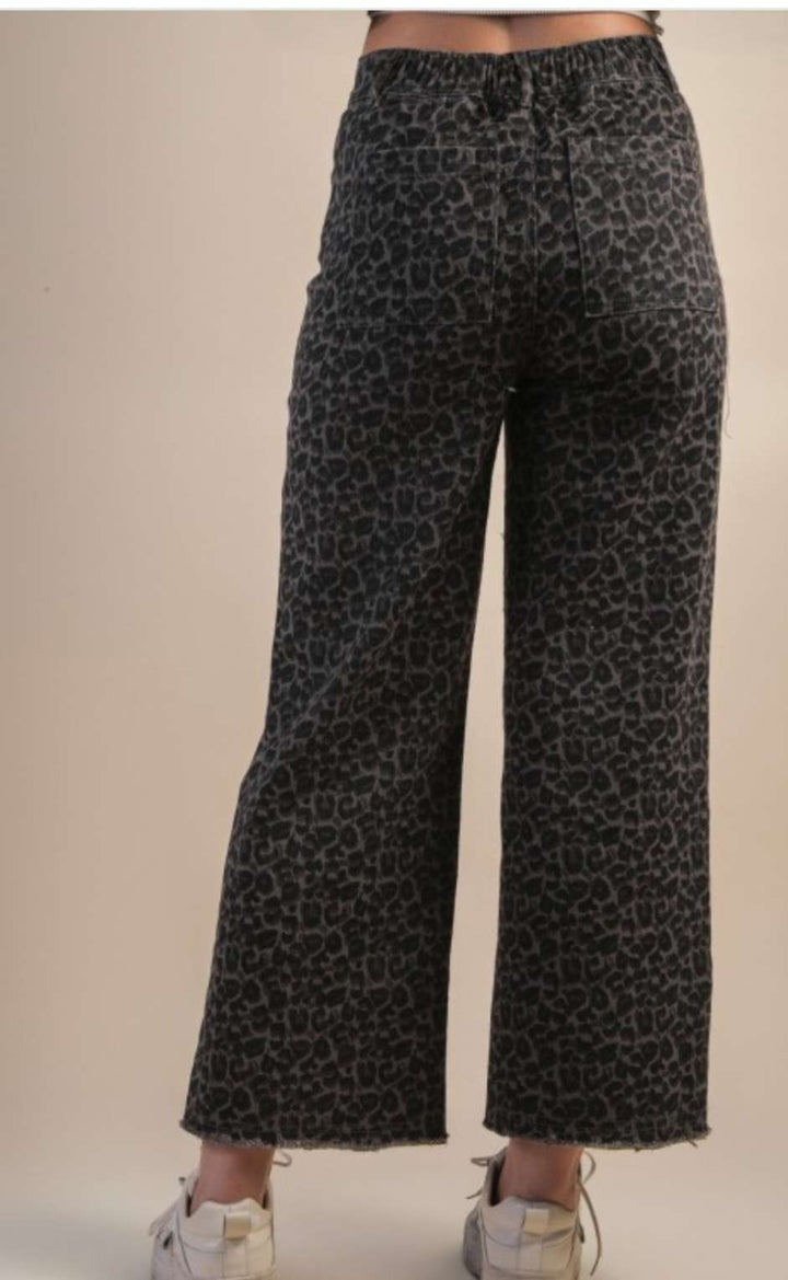Grey animal print jeans with leopard pattern for a bold fashion look