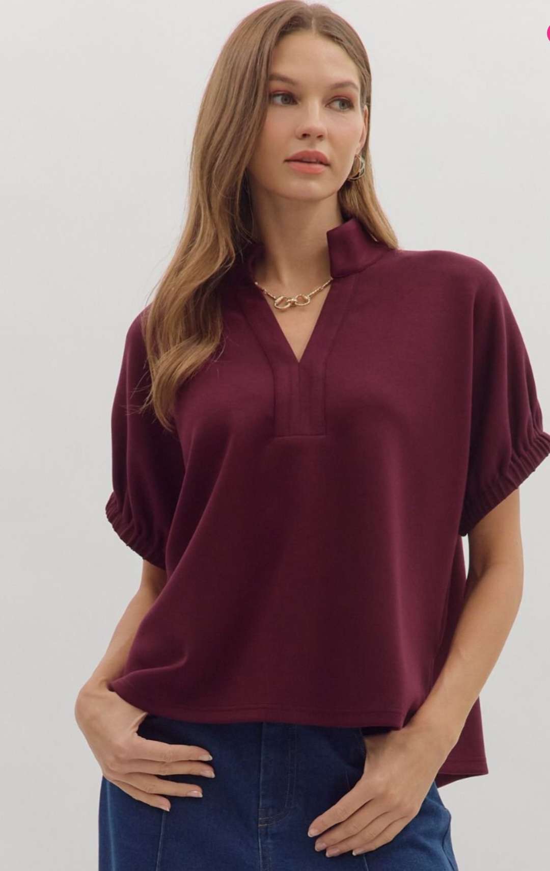 Trendy women's V-neck top in deep burgundy hue
