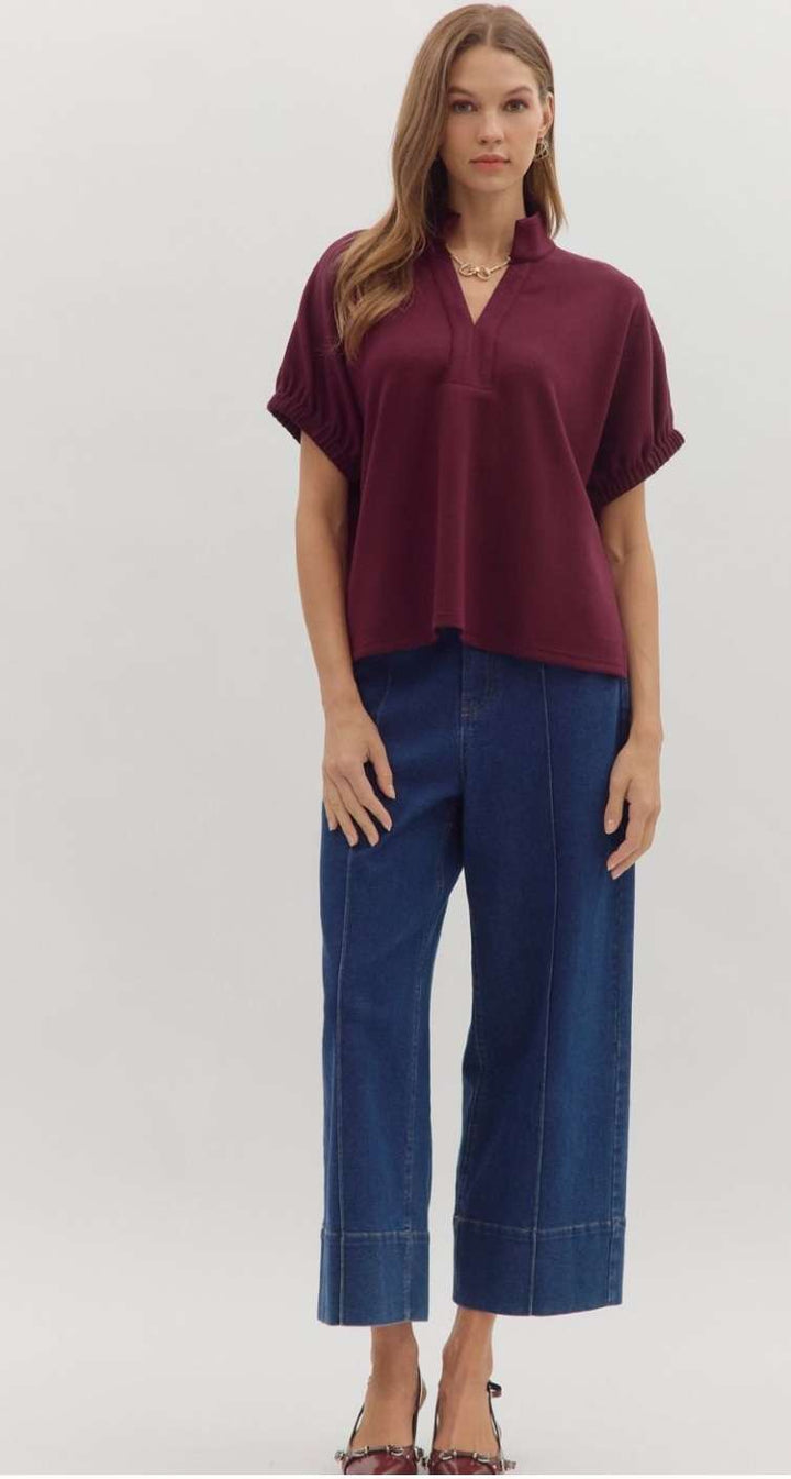 Trendy women's V-neck top in deep burgundy hue