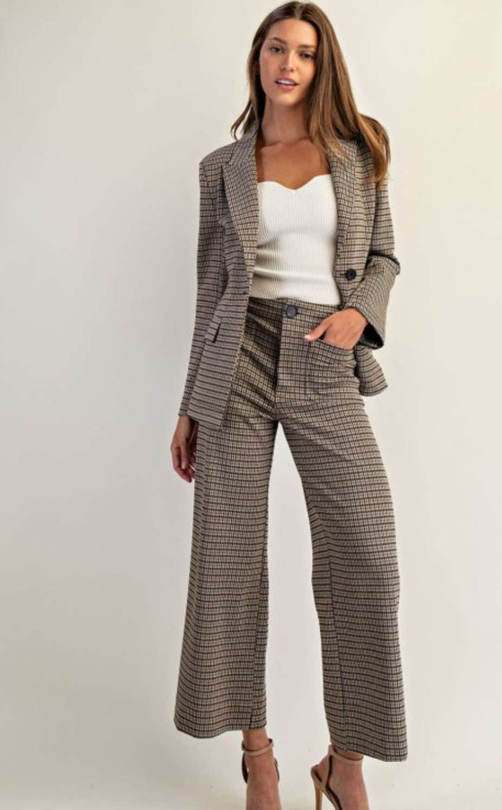 Women's brown houndstooth pants with high waist and tailored fit