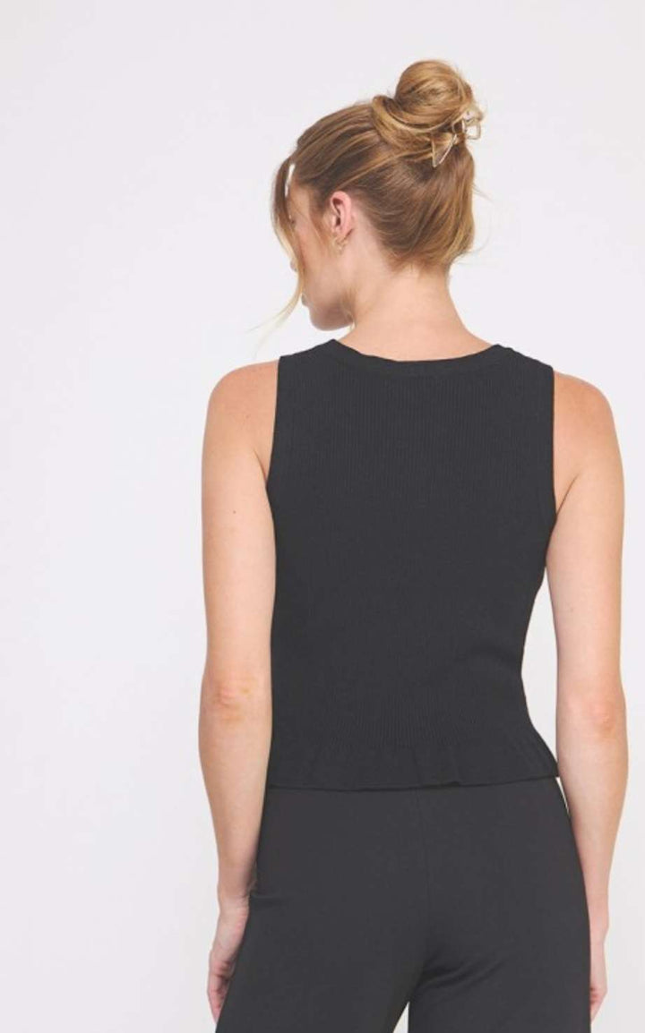 Women's knit peplum tank top – sleeveless fitted blouse with flared hem for casual or dressy wear