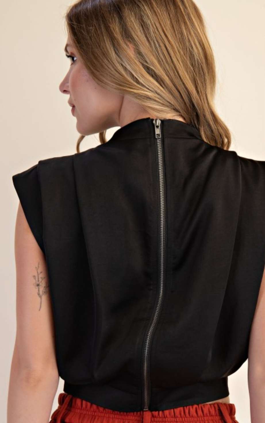 Women's black top with back zipper closure – sleek and modern blouse for casual or office wear