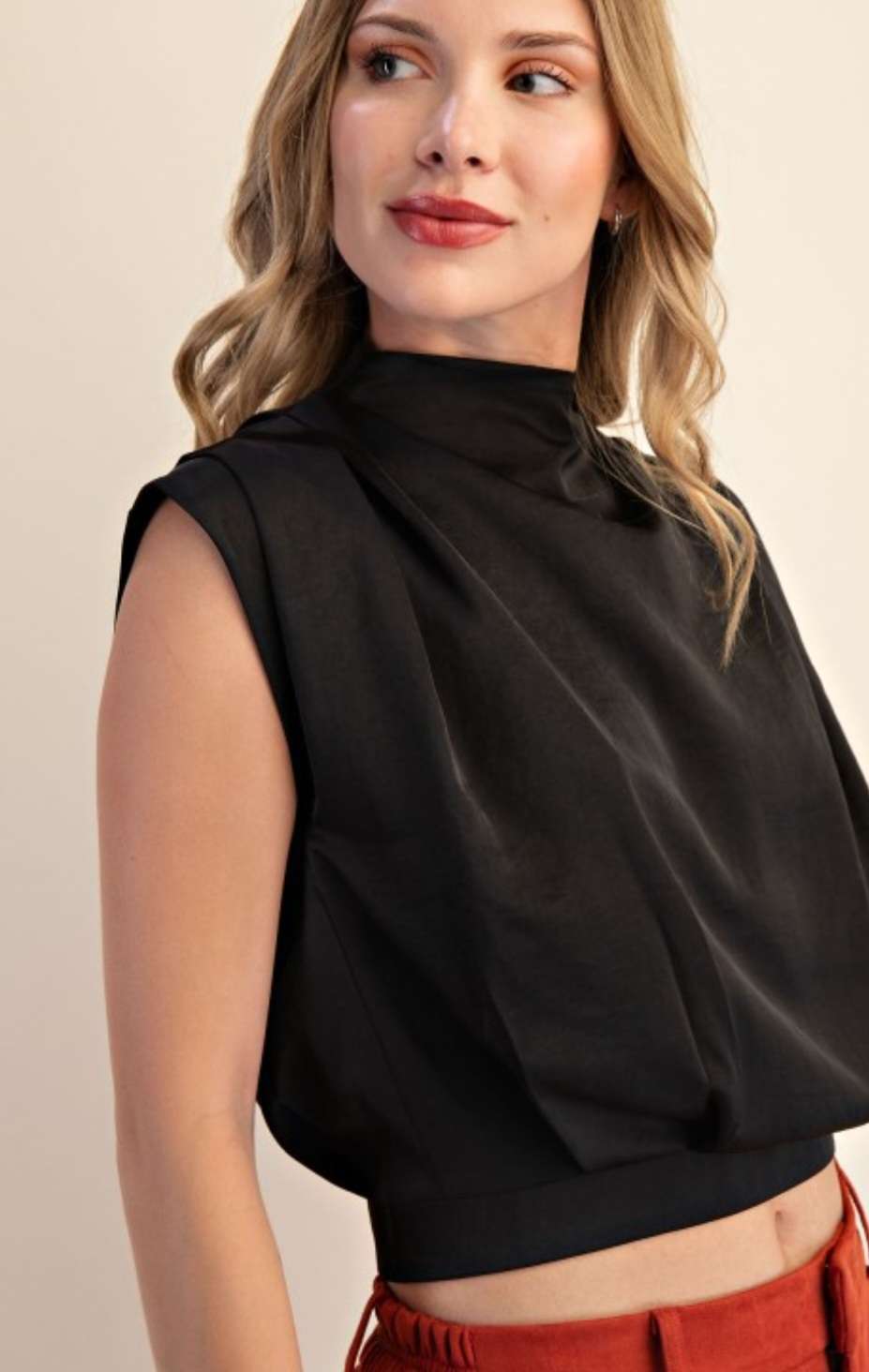 Women's black top with back zipper closure – sleek and modern blouse for casual or office wear