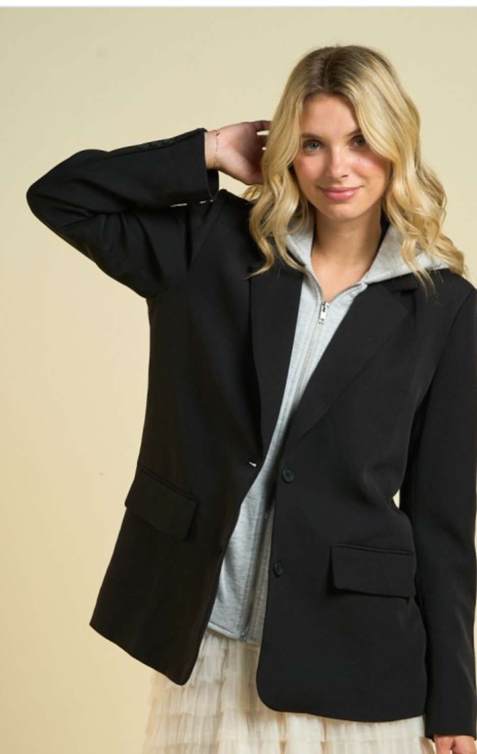 Black and grey hoodie blazer with a casual yet sophisticated design, featuring a comfortable hood and tailored blazer fit, perfect for smart-casual and streetwear styles.