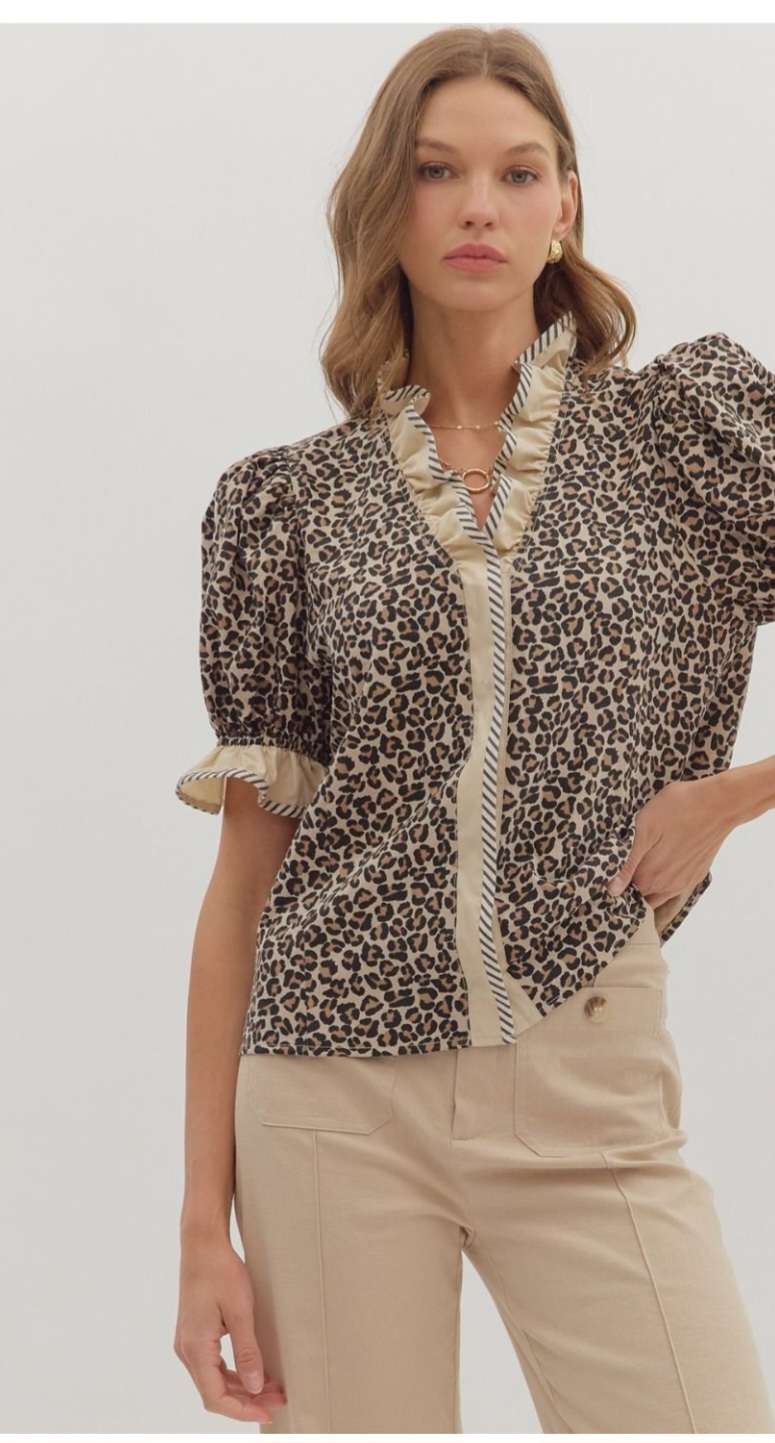 Women's leopard print puff sleeve top for a bold, stylish look