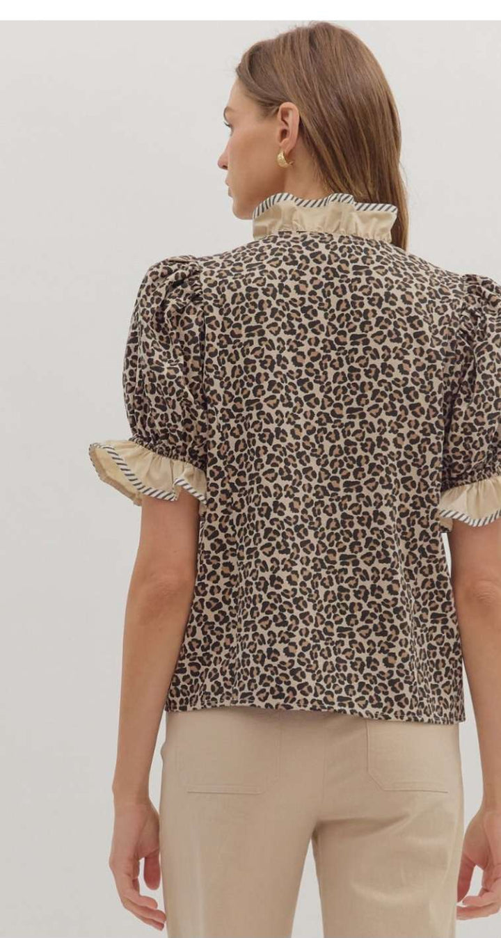 Women's leopard print puff sleeve top for a bold, stylish look