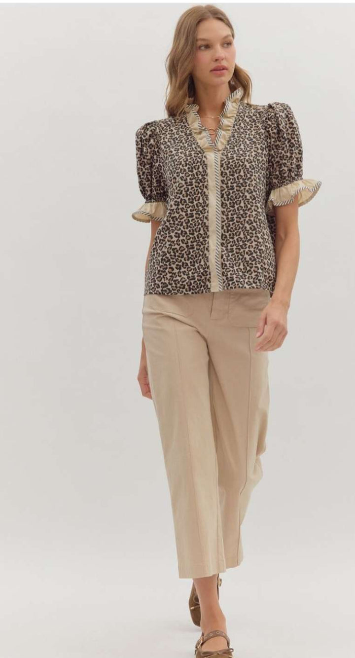 Women's leopard print puff sleeve top for a bold, stylish look