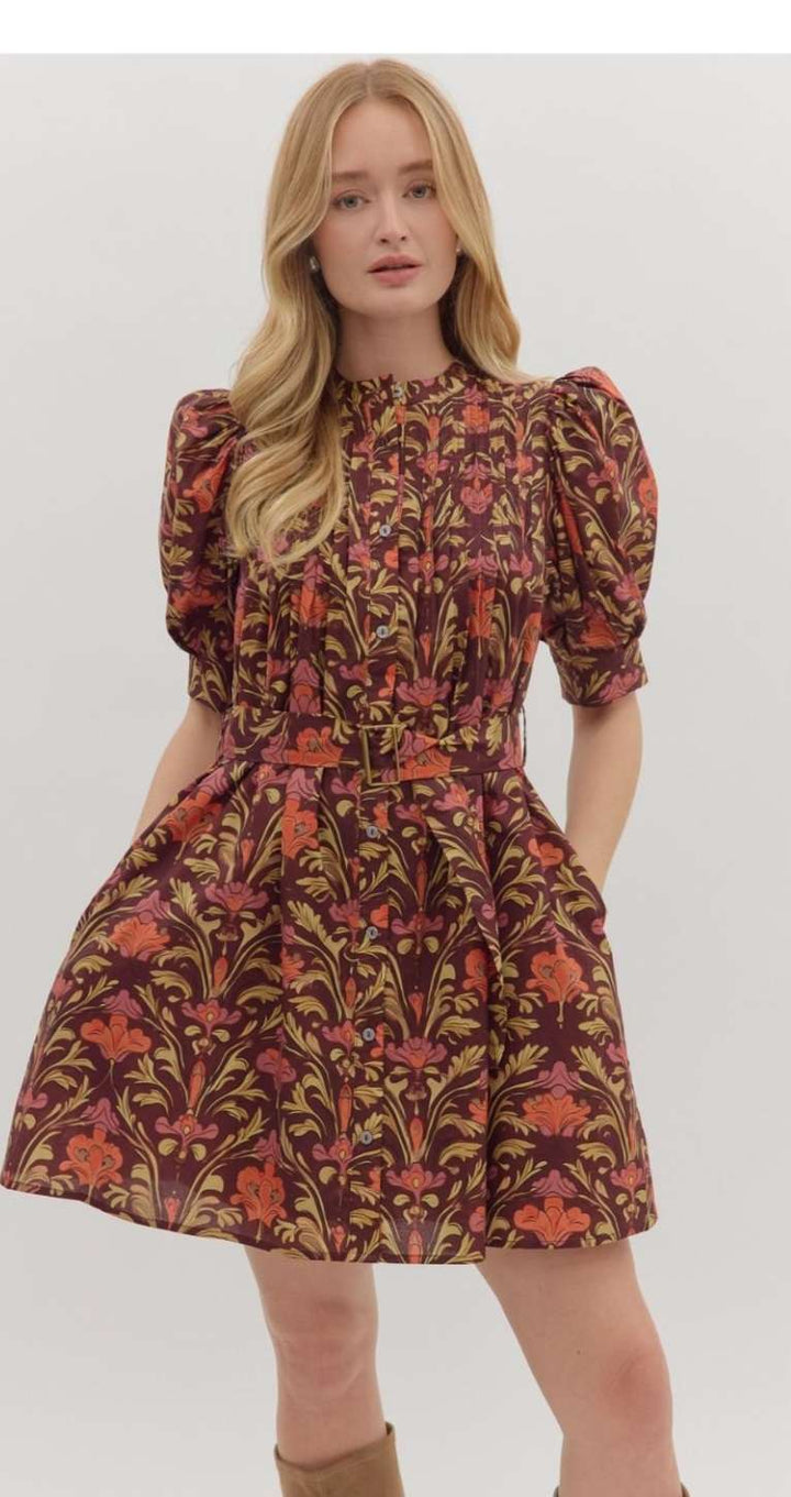 Burgundy floral print belted dress with a flattering waist tie and flowy silhouette, perfect for casual or semi-formal occasions.