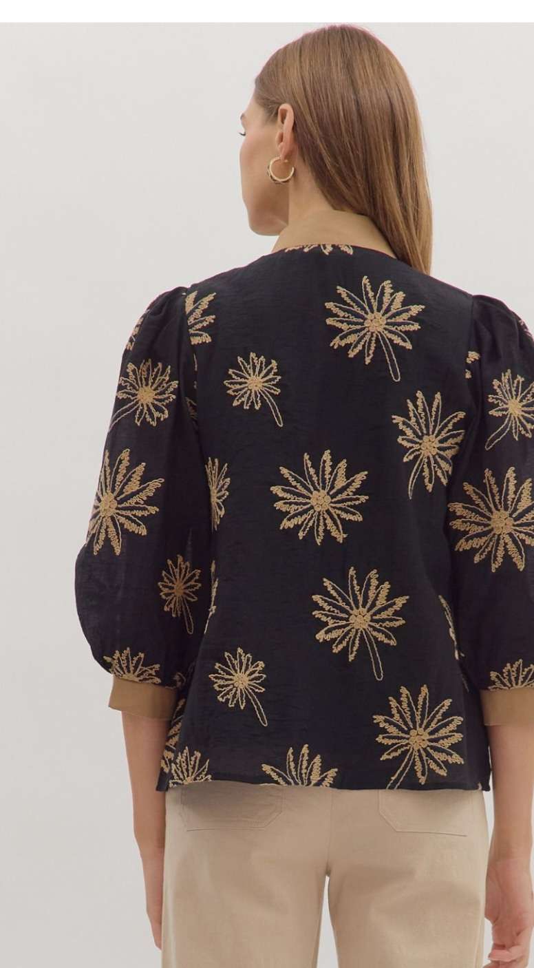 Black embroidered 3/4 sleeve women’s top with intricate floral detailing.