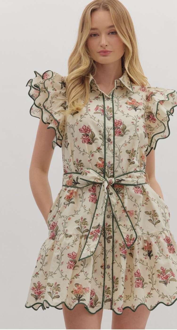 Ecru floral dress with green trim, featuring delicate floral print and elegant lightweight fabric
