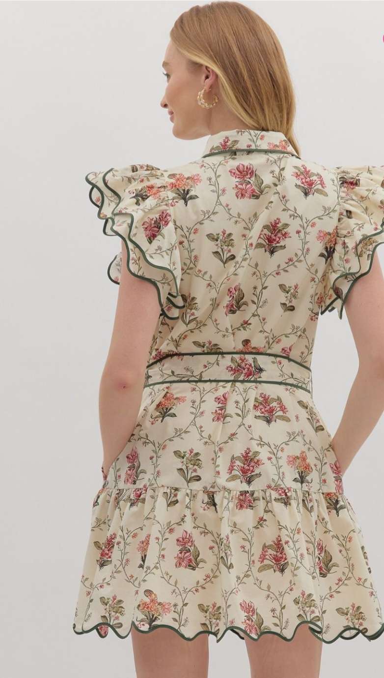 Ecru floral dress with green trim, featuring delicate floral print and elegant lightweight fabric